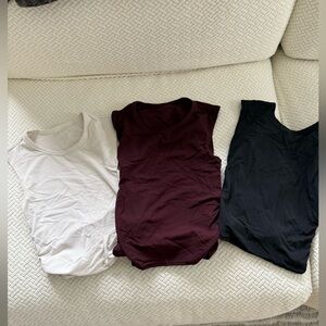 LULULEMON three pack of all it takes twist back tanks! Great condition !